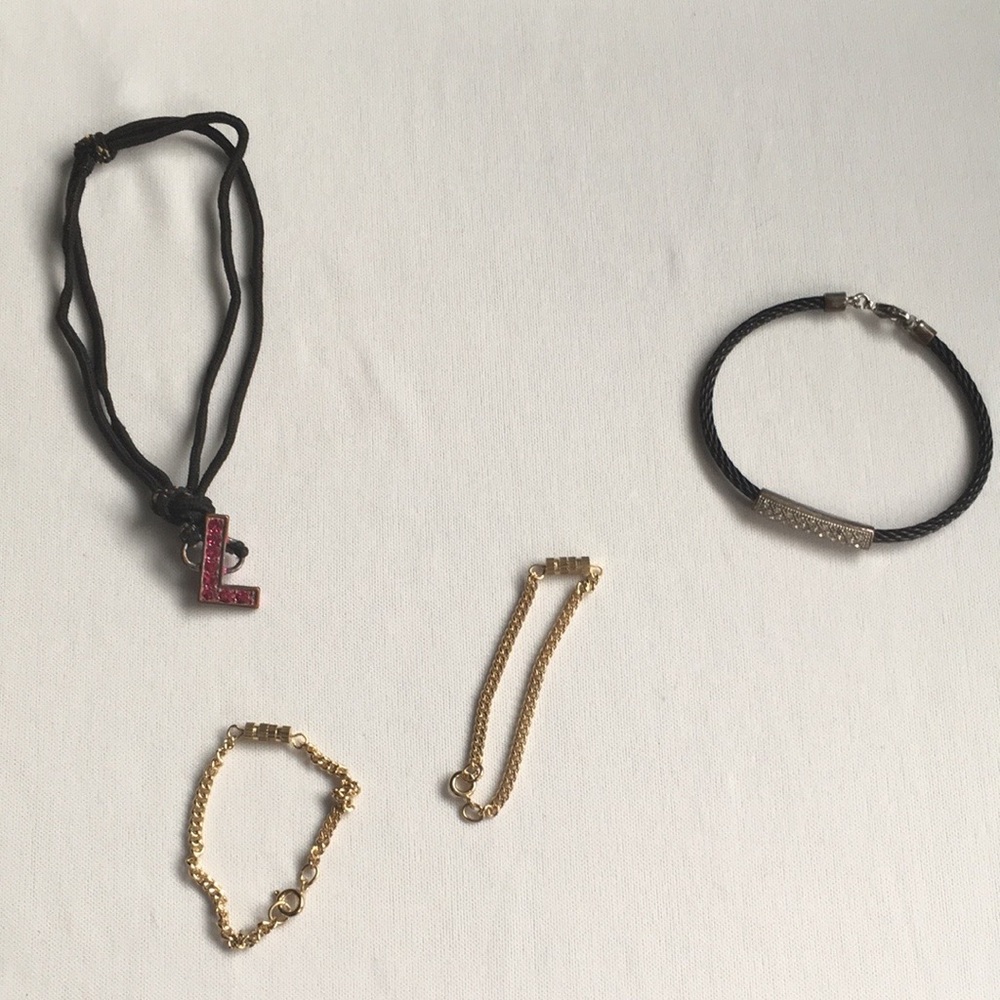 4 bracelets. Silver toned. Gold toned. L P…